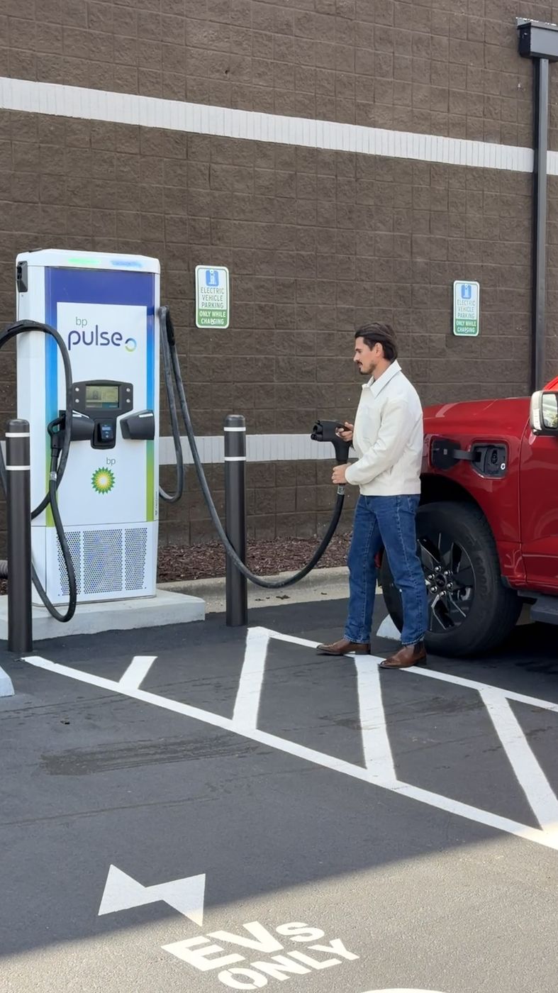 Daniel at a bp pulse EV charging station
